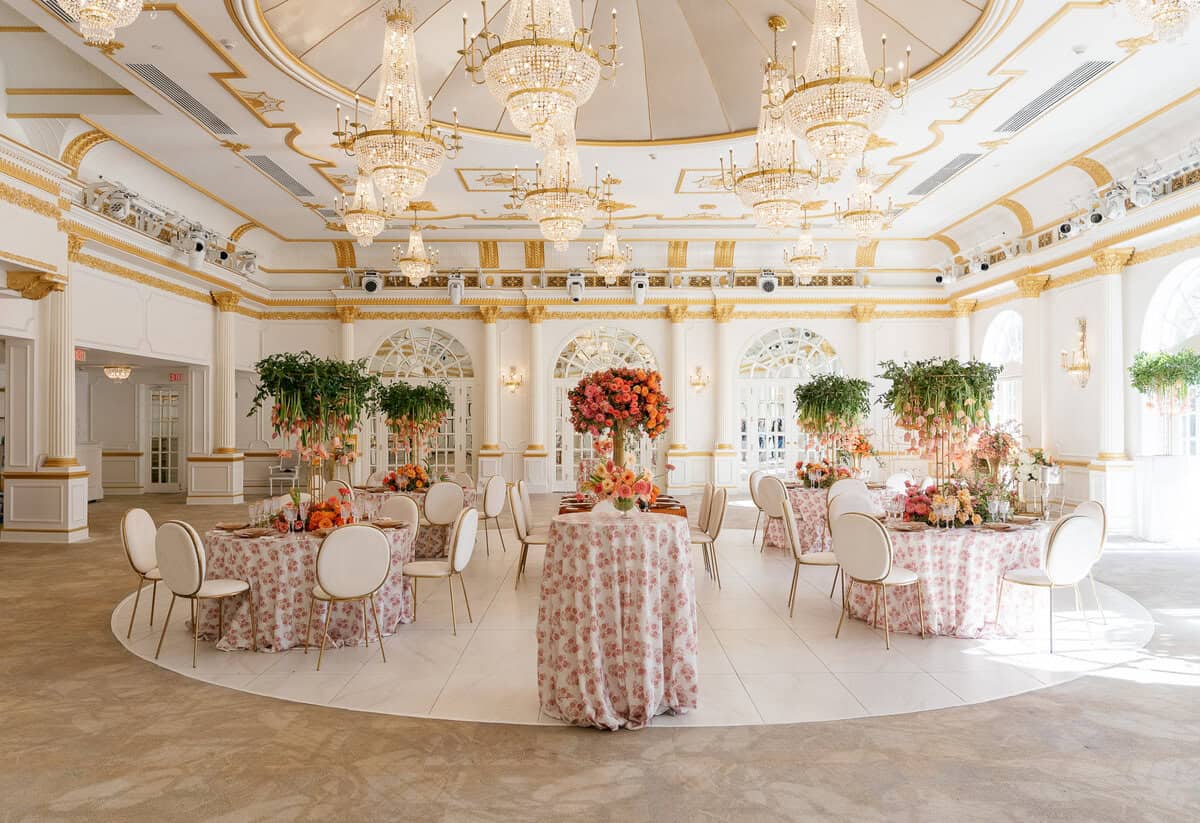 Luxury wedding reception at Crystal Plaza, featuring elegant floral arrangements, fresh blooms, and a sophisticated event space.