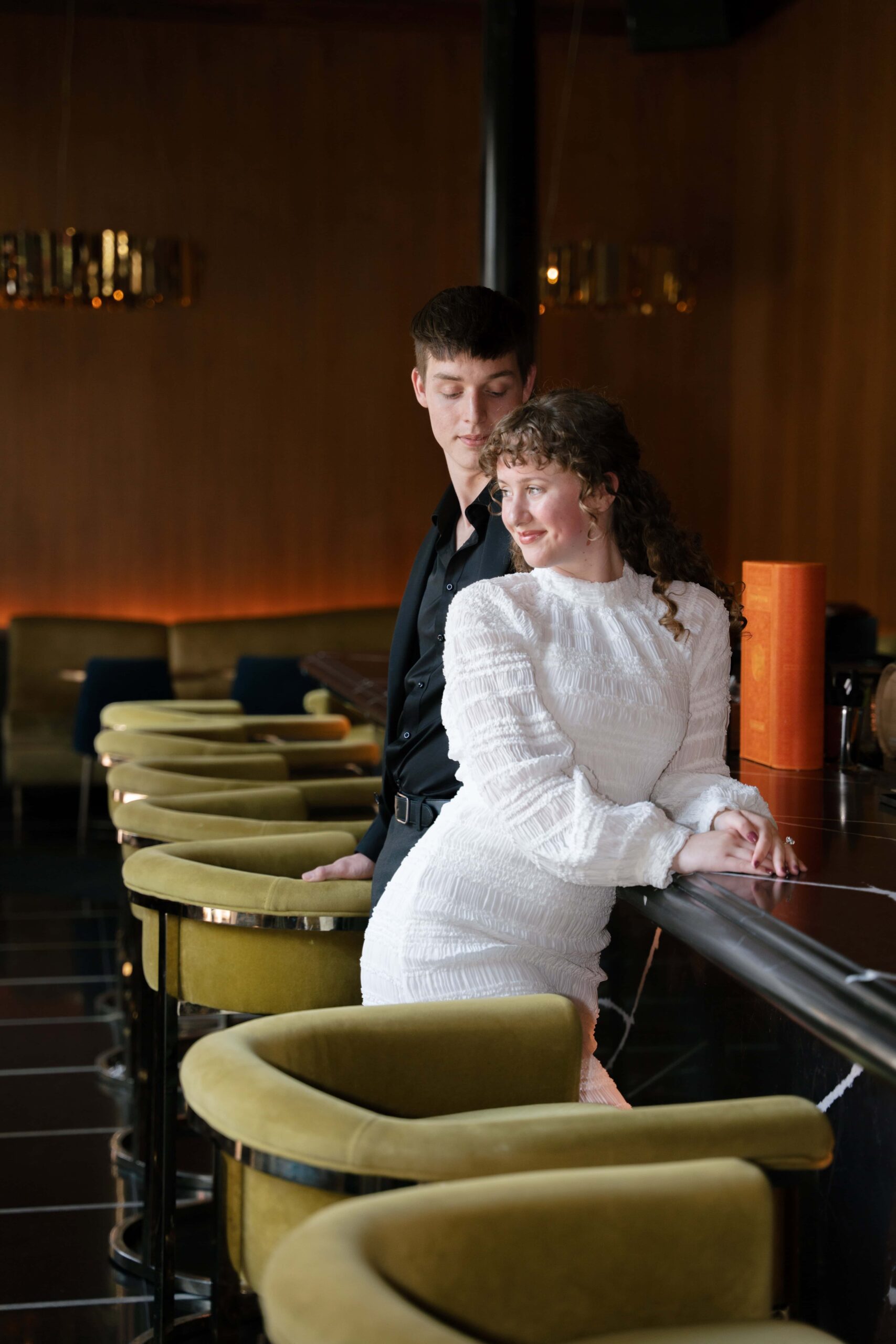Downtown Charleston bar engagement session at Bourbon and Bubbles
